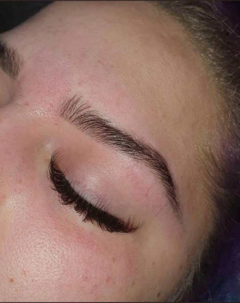 Close-up of a finished lash and brow treatment by Leanne
